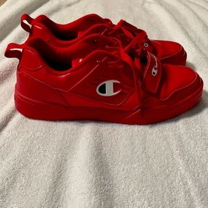 I am selling a red pair of champion shoes.